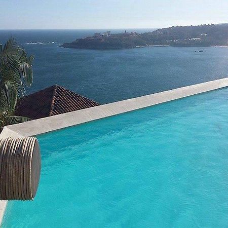 Отель Casa Del Mar Huatulco Экстерьер фото